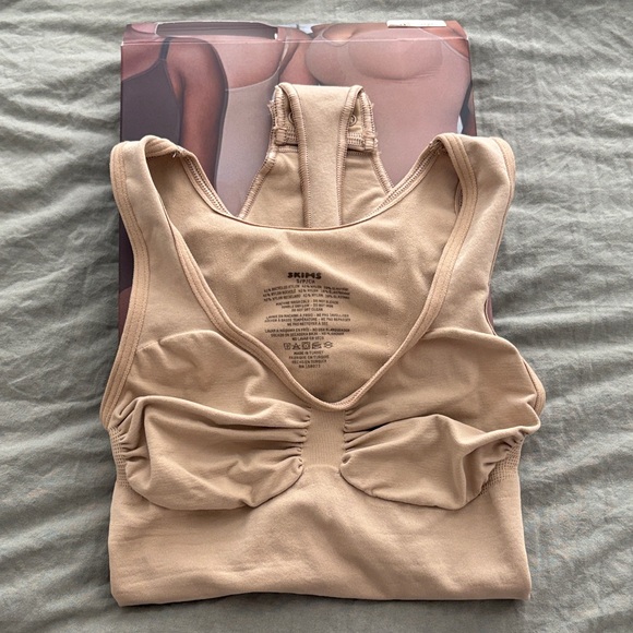 SKIMS Scoop Neck Thong Bodysuit in Clay - Picture 3 of 4